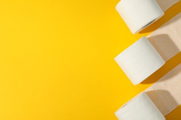 Toilet paper on yellow