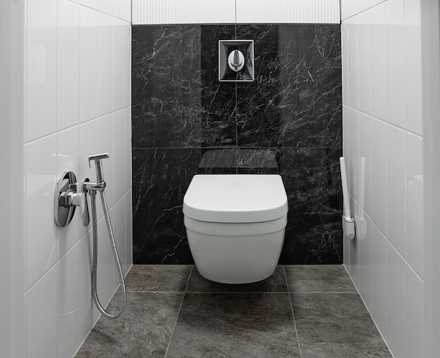 Toilet room interior loft style design in white and black color