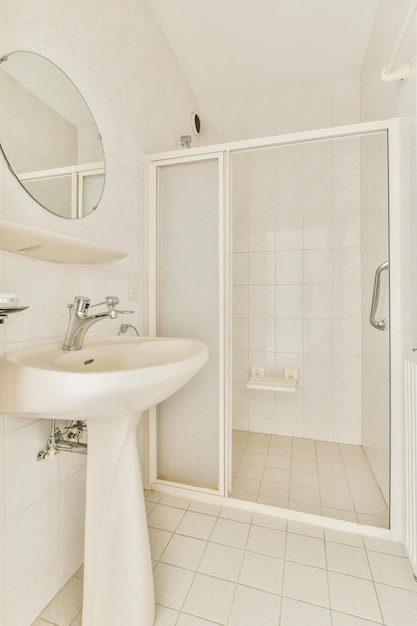 Toilet with white tiled walls