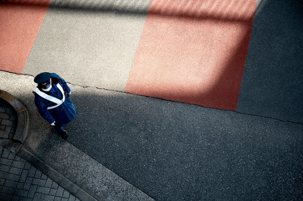 Tokyo officer traffic managing on the street