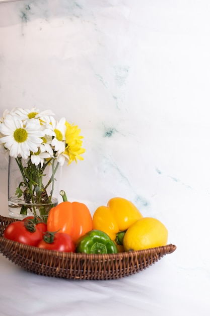 Tomato and bell peppers on basket platter