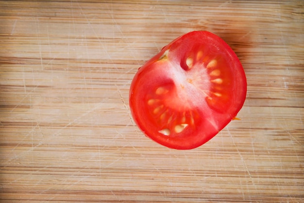 Tomato on chopping board