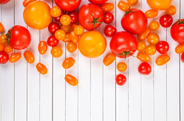 Tomato harvest on wooden table