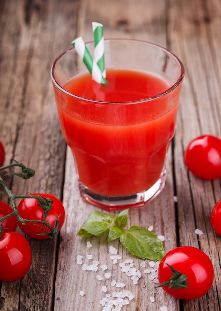 Tomato juice in a glass beaker.