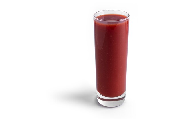 Tomato juice in glass isolated on white.