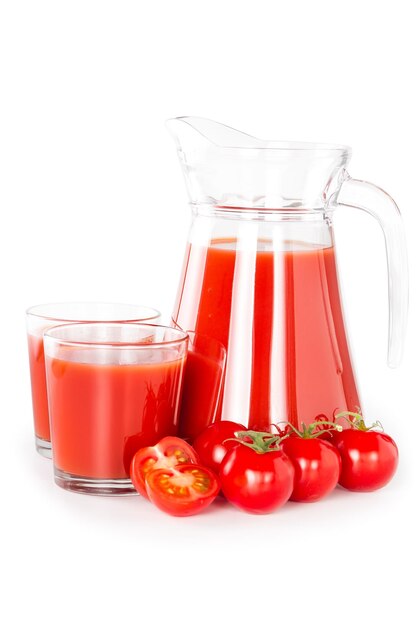 Tomato juice in a glass jug isolated on white background