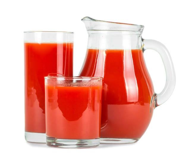 Tomato juice in glasses .