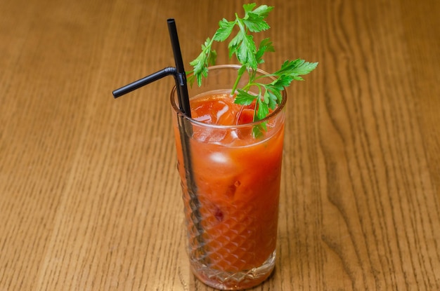 tomato juice with ice in a glass