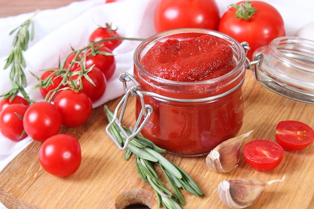 Tomato paste on the table top view tomato sauce