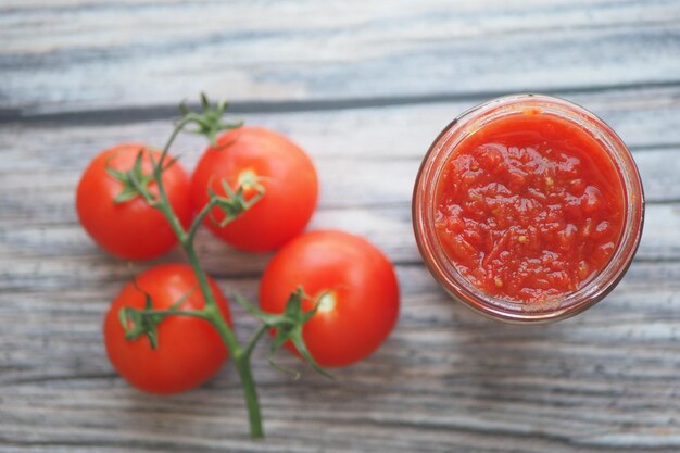 Tomato paste with ripe tomatoes