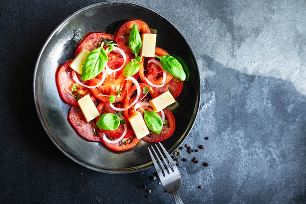 tomato salad and cheese veggie vegetable basil on the table healthy food