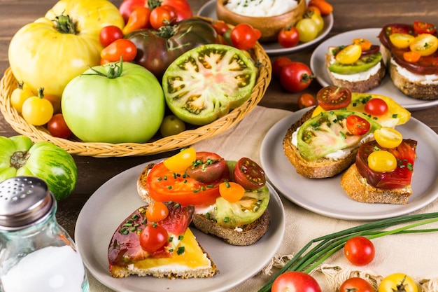 Tomato sandwich made with organic heirloom tomatoes.