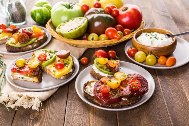 Tomato sandwich made with organic heirloom tomatoes.