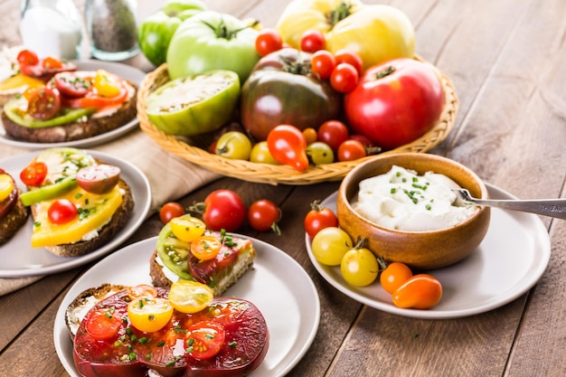 Tomato sandwich made with organic heirloom tomatoes.