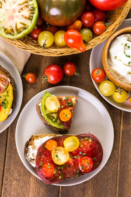 Tomato sandwich made with organic heirloom tomatoes.