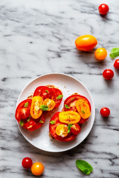 Tomato sandwich on marble