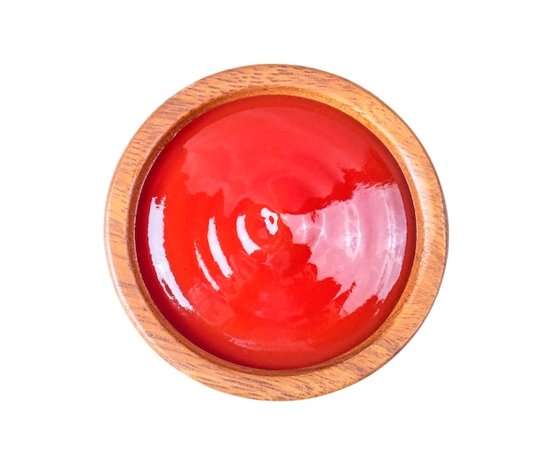 Tomato sauce in a bowl on white background