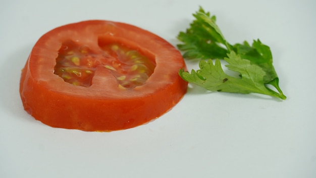 Tomato slice close up isolated