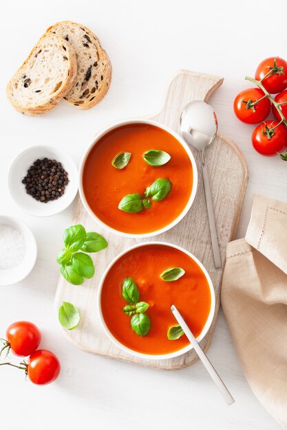 Tomato soup flat lay on white backgorund