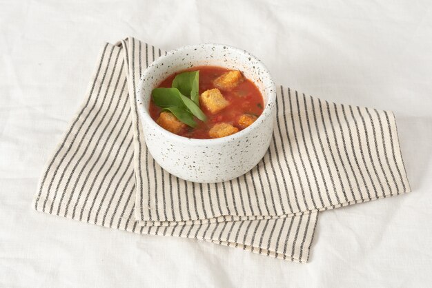 Tomato soup served in a bowl