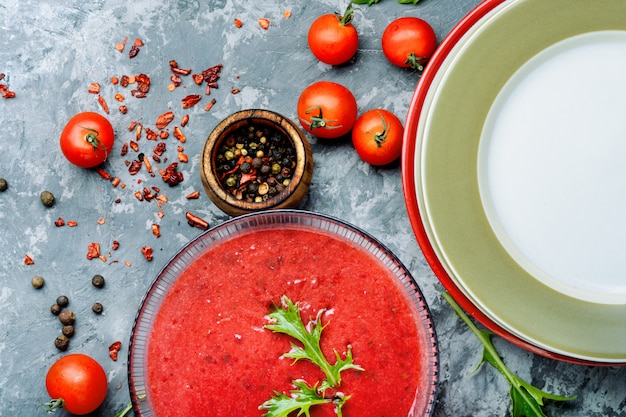 Tomato soup on stone background