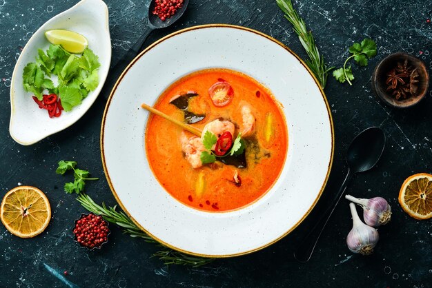 Tomato soup with seafood shrimp and mussels Top view Free space for text