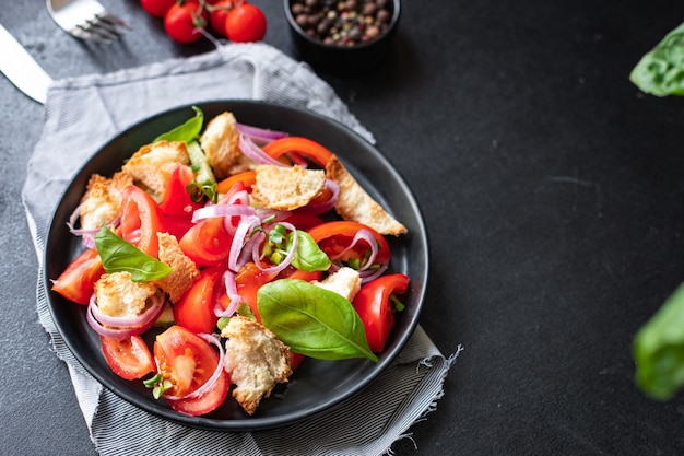 Tomato vegetable salad panzanella veggie croutons olive oil rusk vegan vegetarian food