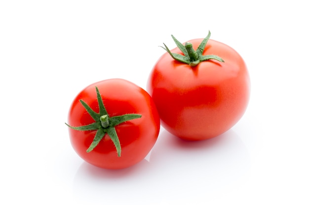 Tomato on the white isolatd background.