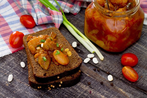 Tomatoes and beans on bread