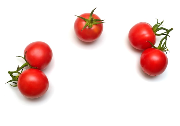 Tomatoes collection of whole and sliced isolated on white background. Tasty and healthy food. Flat lay, top view