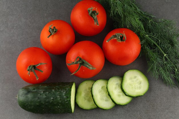 Tomatoes and cucumbers closeup Food of vegetarians