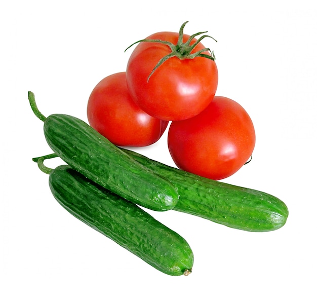 Tomatoes and cucumbers isolated on a white 