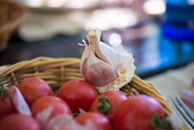 Tomatoes and garlic in a basquet