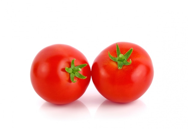 Photo tomatoes isolated on white background