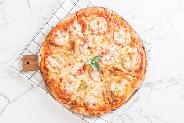 tomatoes pizza on table 