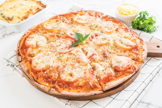 tomatoes pizza on table 