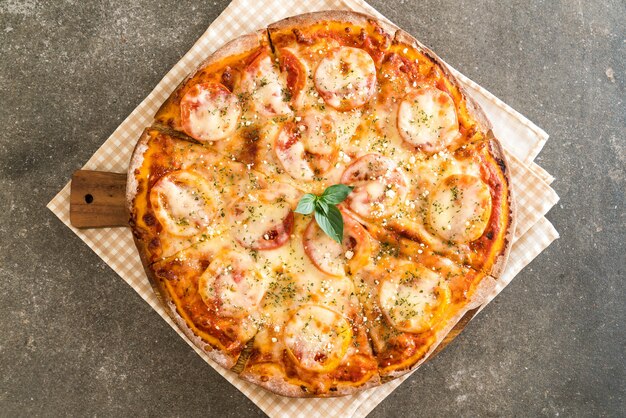 tomatoes pizza on table 