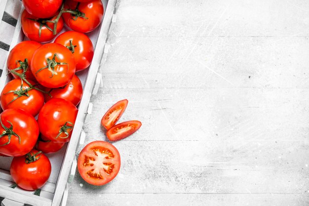 Tomatoes in a plastic box