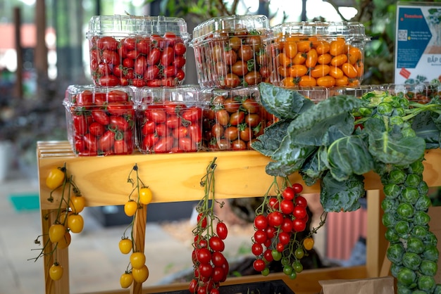 Tomatoes on plastic containers photo