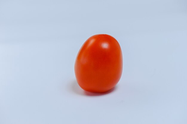 Tomatoes on white background