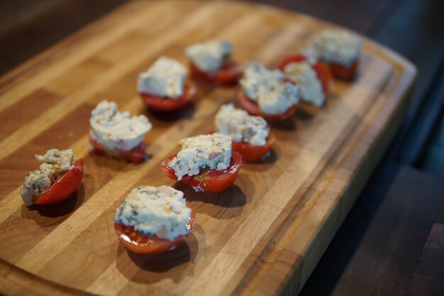 Tomatoes with farmer paneer cottage cheese. vegetarian meal snack appetizer.