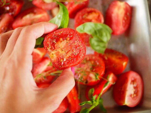 Tomatoes with provencal herbs, basil, thyme, and garlic.