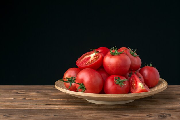 Tomatoes on wooden 