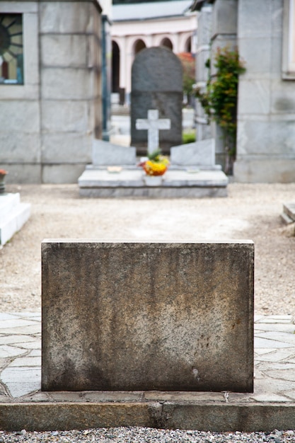 Tombstone in Italian cemetery with copy space