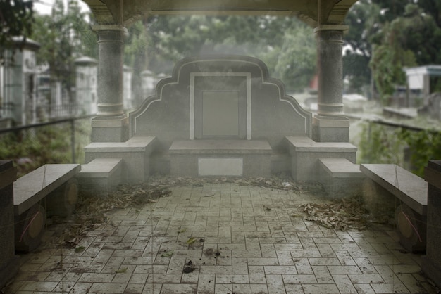 Tombstones on the graveyard with the foggy background. Halloween concept