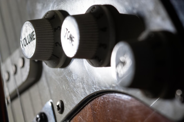 Tone potentiometer on an electric guitar in macro