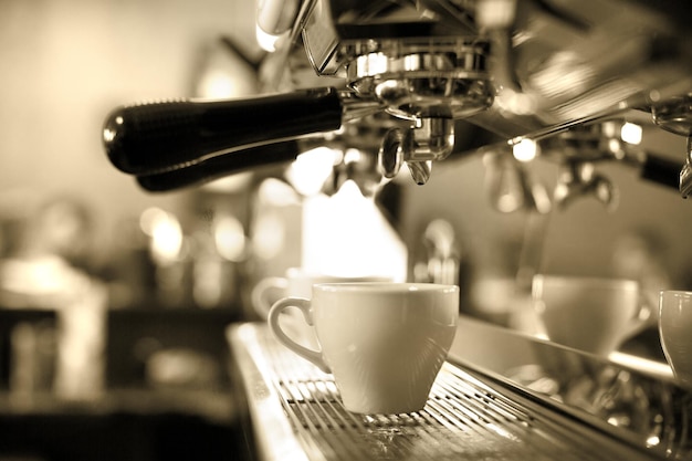 Toned image of a professional coffee machine