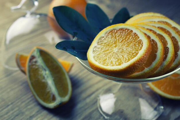 Toned orange fruit on wooden background