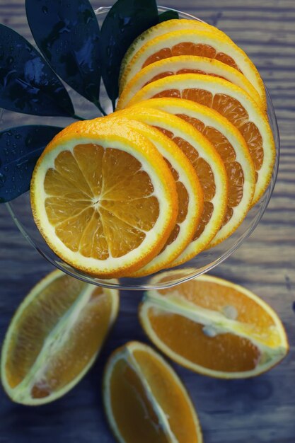 Toned orange fruit on wooden background