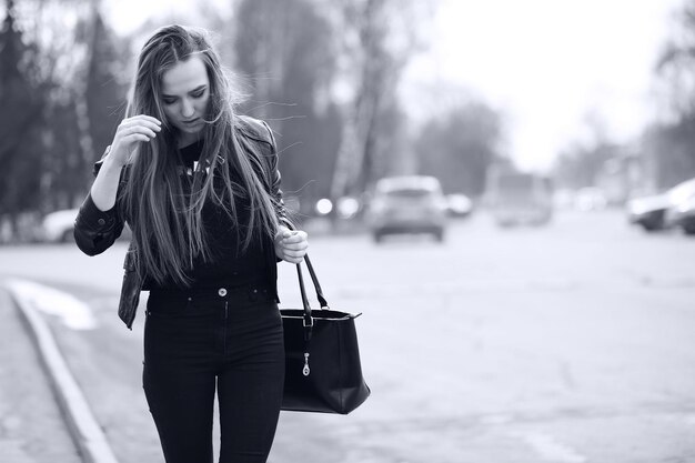 Toned picture of a young cute girl on a walk